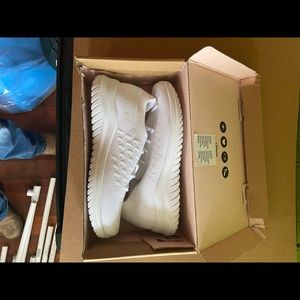 Woman white running shoes